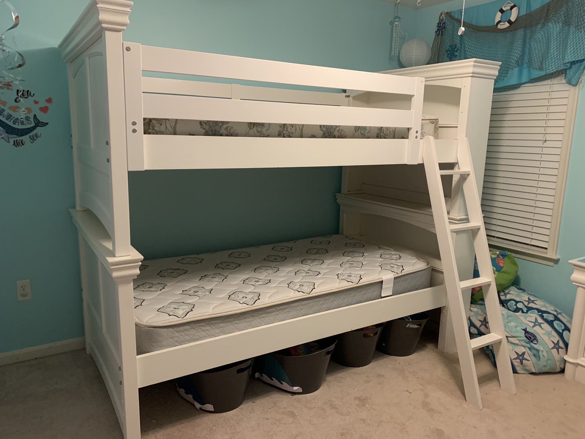 Twin white bunk beds
