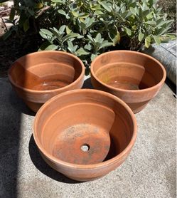 Set of 7 Terracotta plant pots