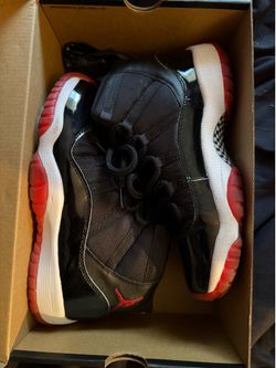 Jordan 11s, size 7Y big kids