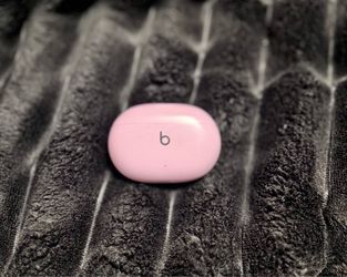 Pink- Beats Studio Buds — wireless Bluetooth earbuds by Beats Electronics.