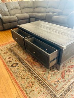 Ashley’s Grey Wood Coffee Table