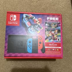 Brand New Nintendo Switch With Mario Kart Deluxe 8