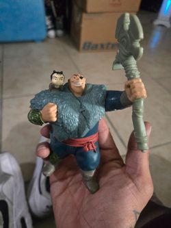 2020 McDonald's Happy Meal toy featuring the character Tong from Disney's Raya and the Last Dragon.