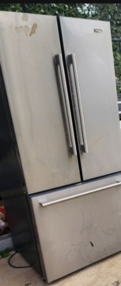 2refrigerator  and a 1 red lg washer  all for 150 .00 obo need minor repairs