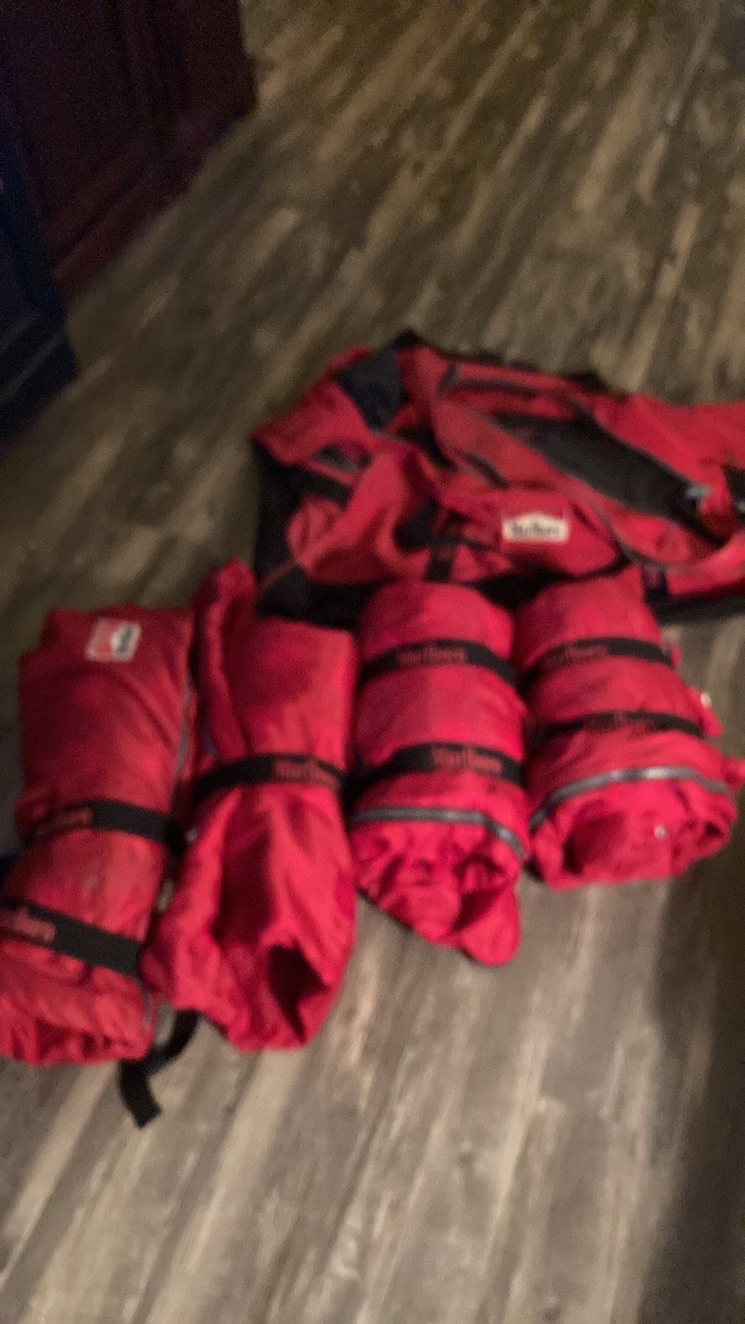 Four sleeping bags and bag