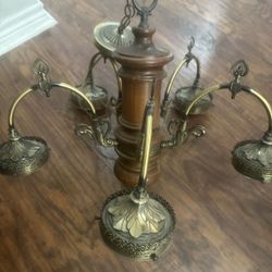 Antique brass and wood chandelier