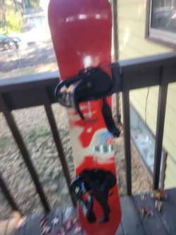 Red Snowboard with Black Bindings