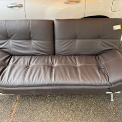 Leather Couch/ Futon. 