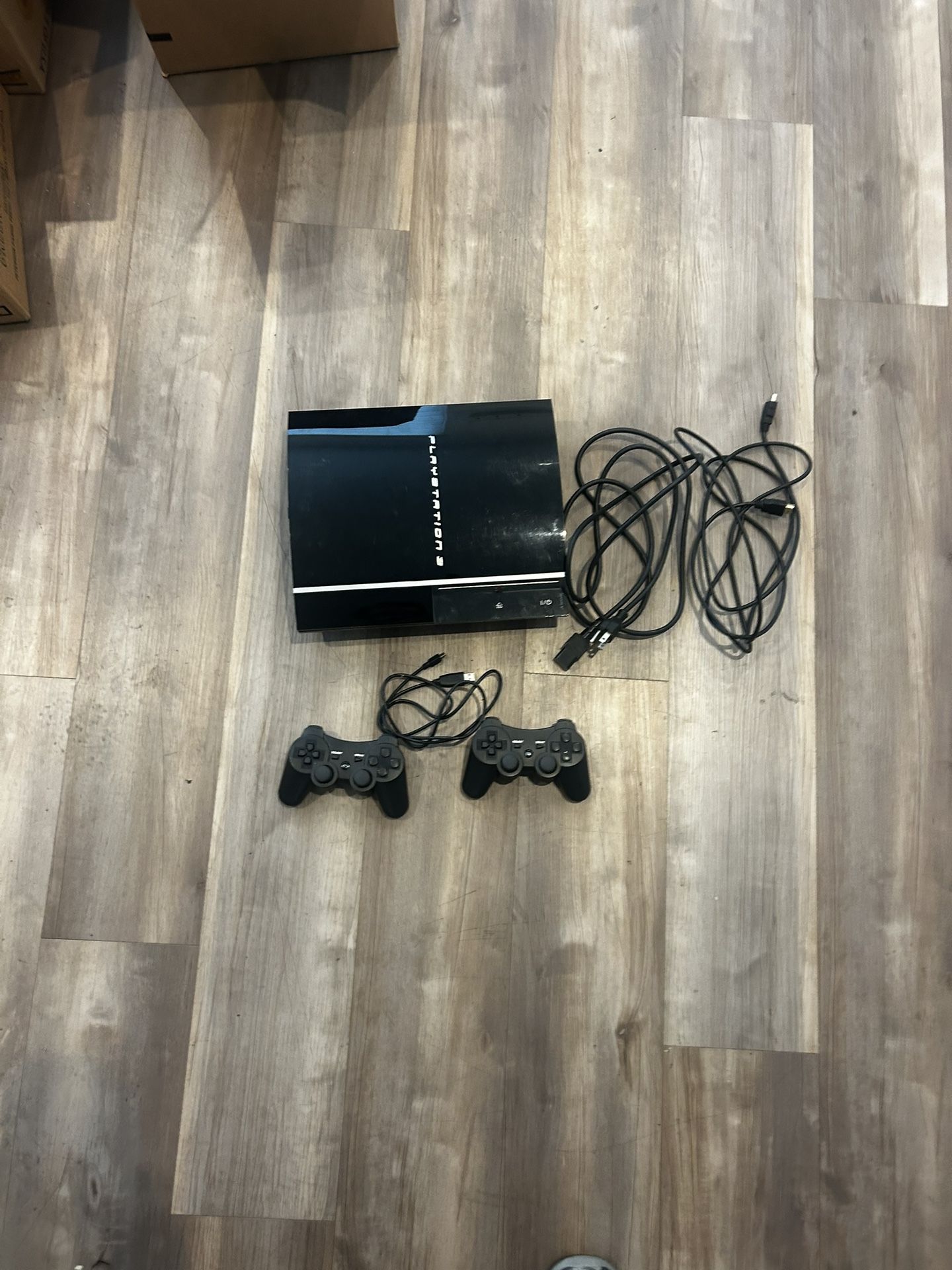 PlayStation 3 W/cords And 2 Okhaha Controllers