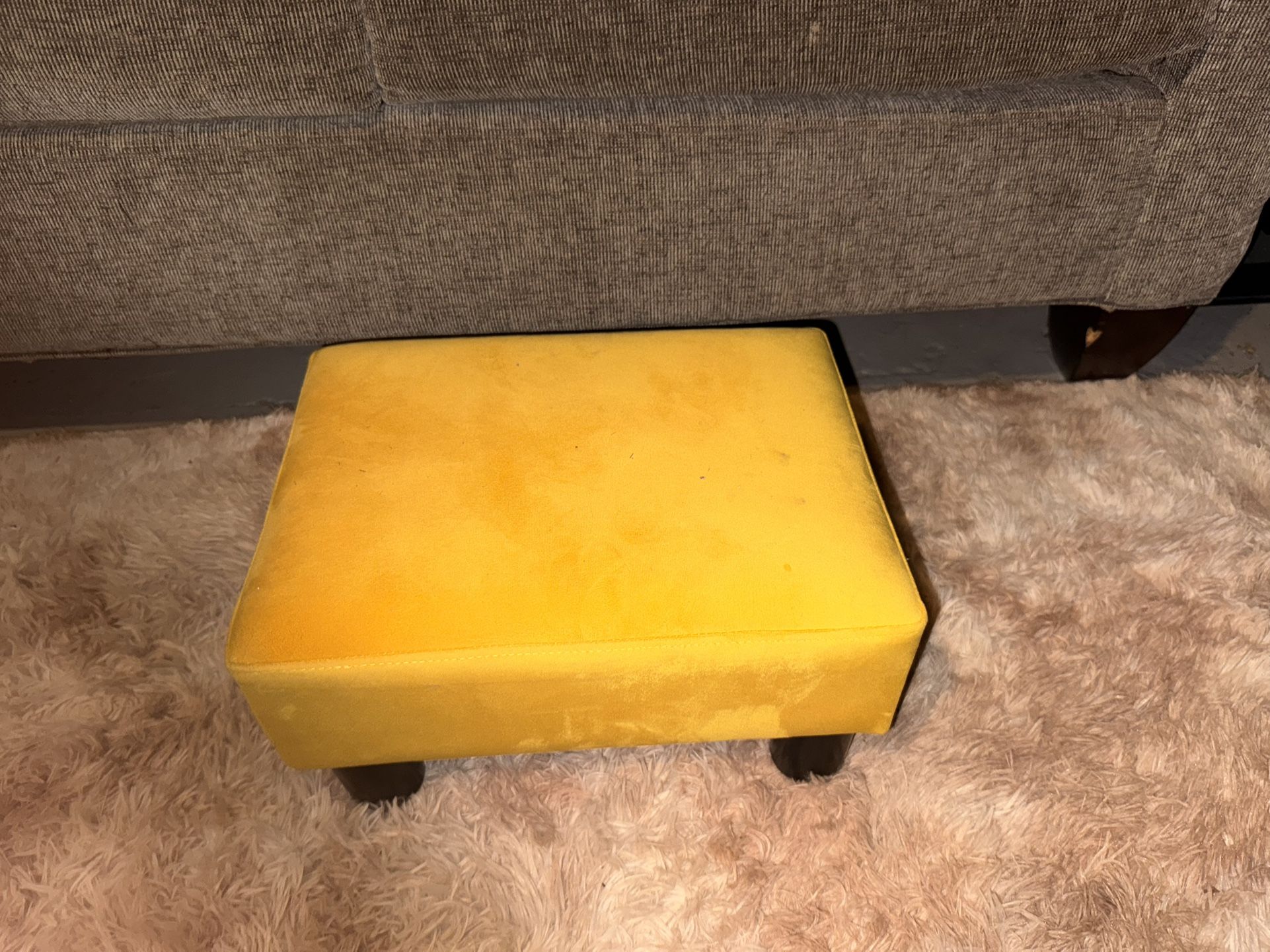 Small yellow ottoman