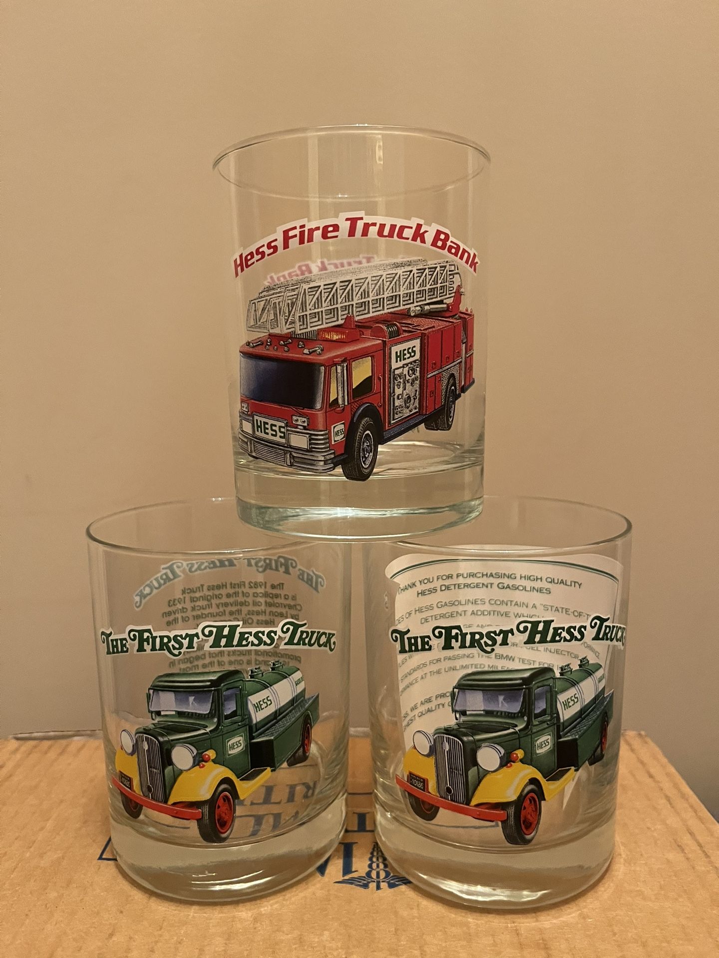 Hess truck series 1996 drinking glasses 2 Hess oil company and 1 fire truck. Glasses are brand new(no original box)