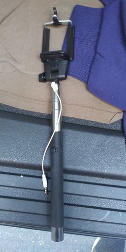 A, SELF STICK FOR IPHONE 3.5MM OR ANY ANDROID PHONE