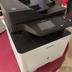 Samsung Xpress C1860FW color laser printer for parts or repair.