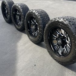 Hostile Rage 22” Wheels with 37” Toyo Tires Made for 8 lug GMC Sierra and Chevy Silverado 2500 and 3500