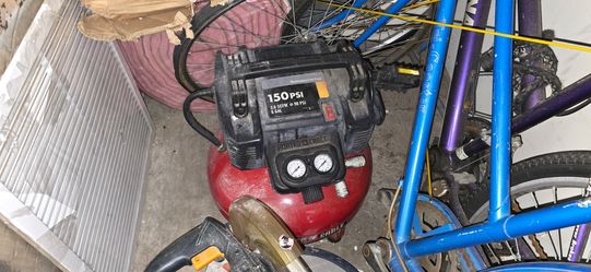 150 psi compressor with nailgun, stapler and another attachment