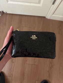 Coach Signature Embossed Wristlet
