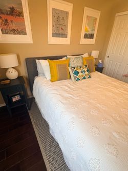 Queen size bed frame. Grey fabric