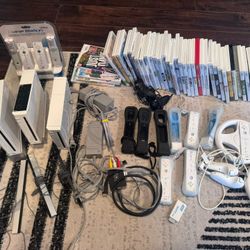 3 Working Wii Consoles. And Many Accesories 