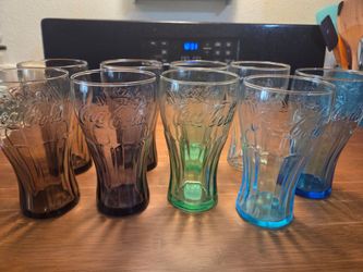 Coca-Cola glasses from McDonald's and Libbey. 2 brown, 2 purple, 2 green, 2 blue, 1 clear