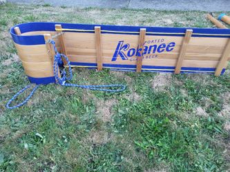 vintage wood  toboggan with Kokanee Glacier Beer