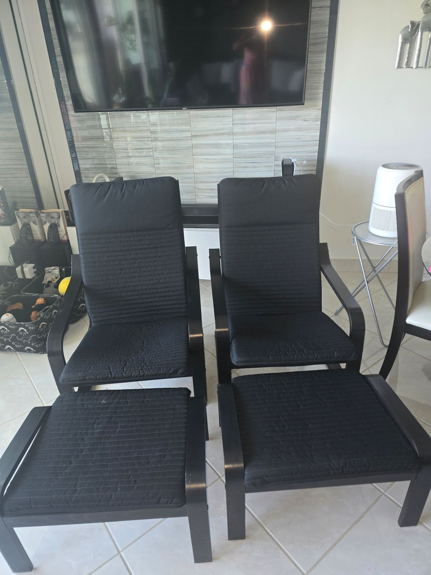 POANG chairs and ottomans