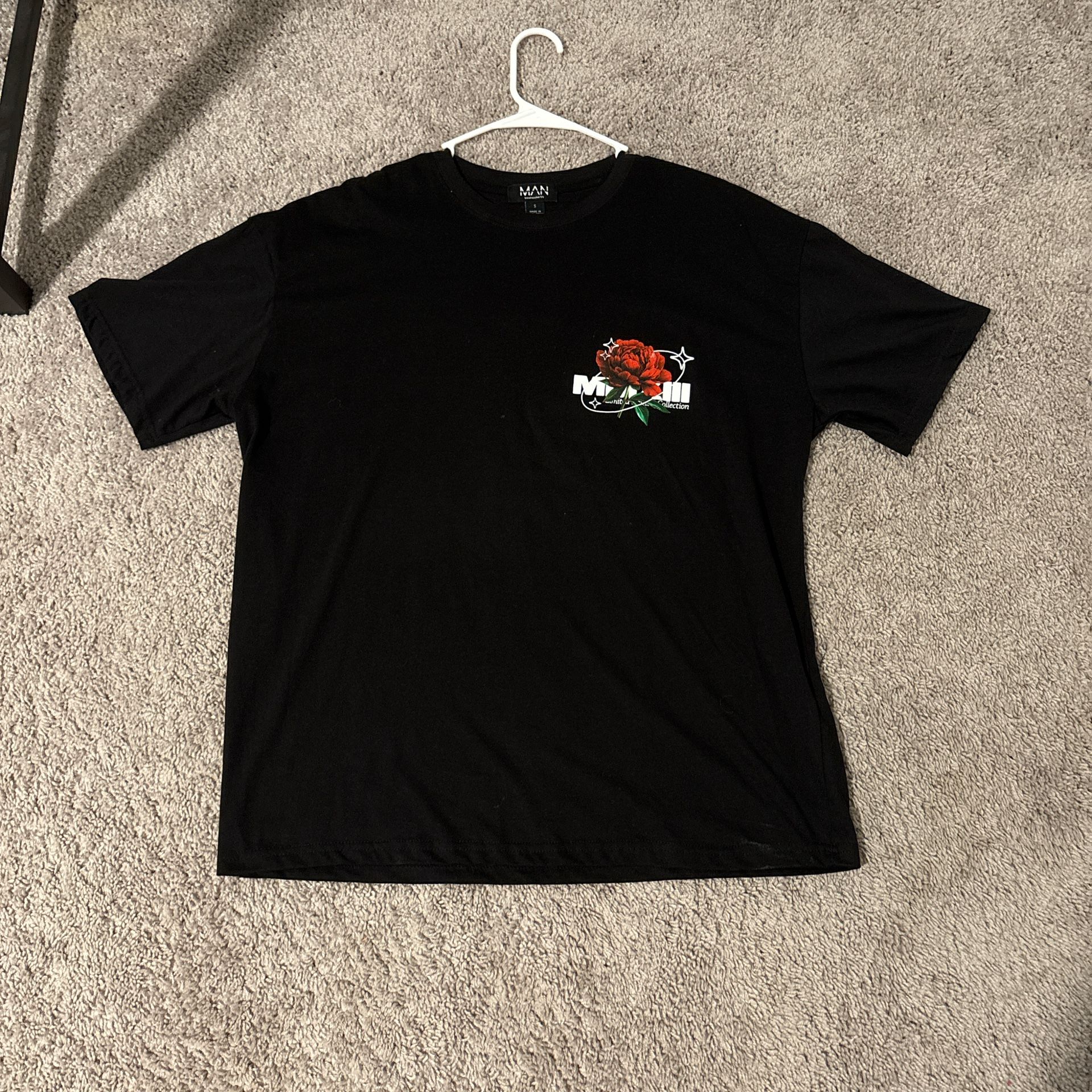 "MAN MAN Brand Black Graphic Tee with Red Rose Design"