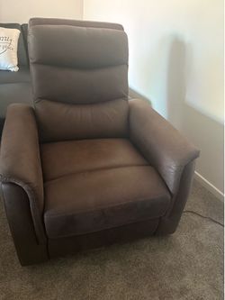 Swivel rocker power recliner with charging station