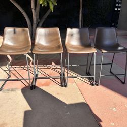 Four Vegan Leather bar stools 