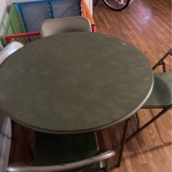 Table And Four Chairs