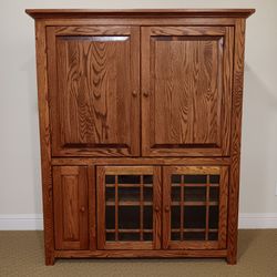 Solid wood entertainment center.