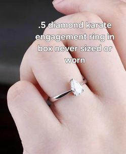 0.5 Carat Pear Diamond Solitaire Engagement Ring