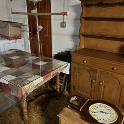 Vintage furniture table is almost 100 years old hutch is matching along with a small end table and chairs one rocking chair one clock shelf one small 