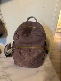 Small tan backpack purse