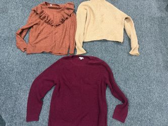 Woman’s sweaters in a size XL