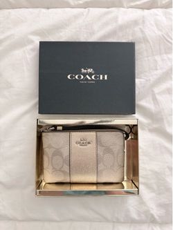 Coach Platinum/Silver Coated Canvas Small Wristlet w/zipp