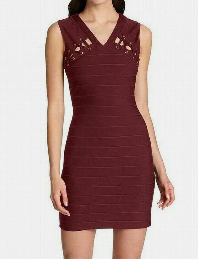 Brand new woman’s Guess brand red wine colored cut out v-neck lace up bandage bodycon dress up for sale