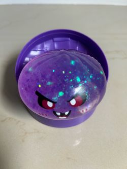 Purple Glitter Monster Face Slime Toy