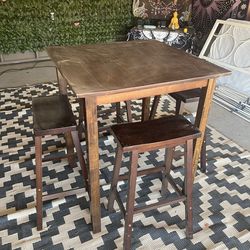 Bar height dining table