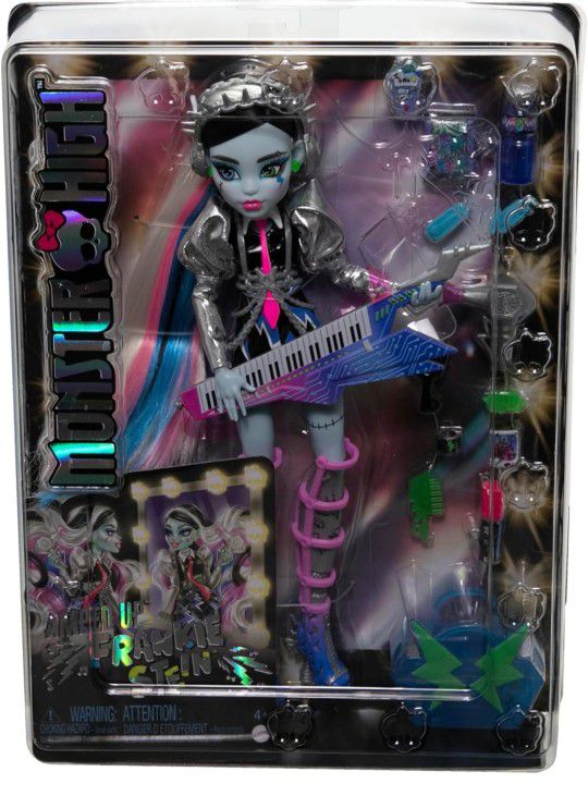 Monster High Doll, Amped Up Frankie Stein Rockstar with Instrument and Performance-Themed Accessories

