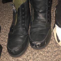 The Red Nikes With The Strap Don’t Have Laces And So Do The Black Boots