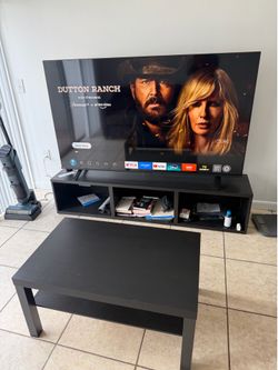 75” TV with 2 tables