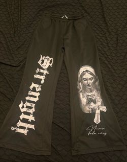 Black sweatpants with white lettering