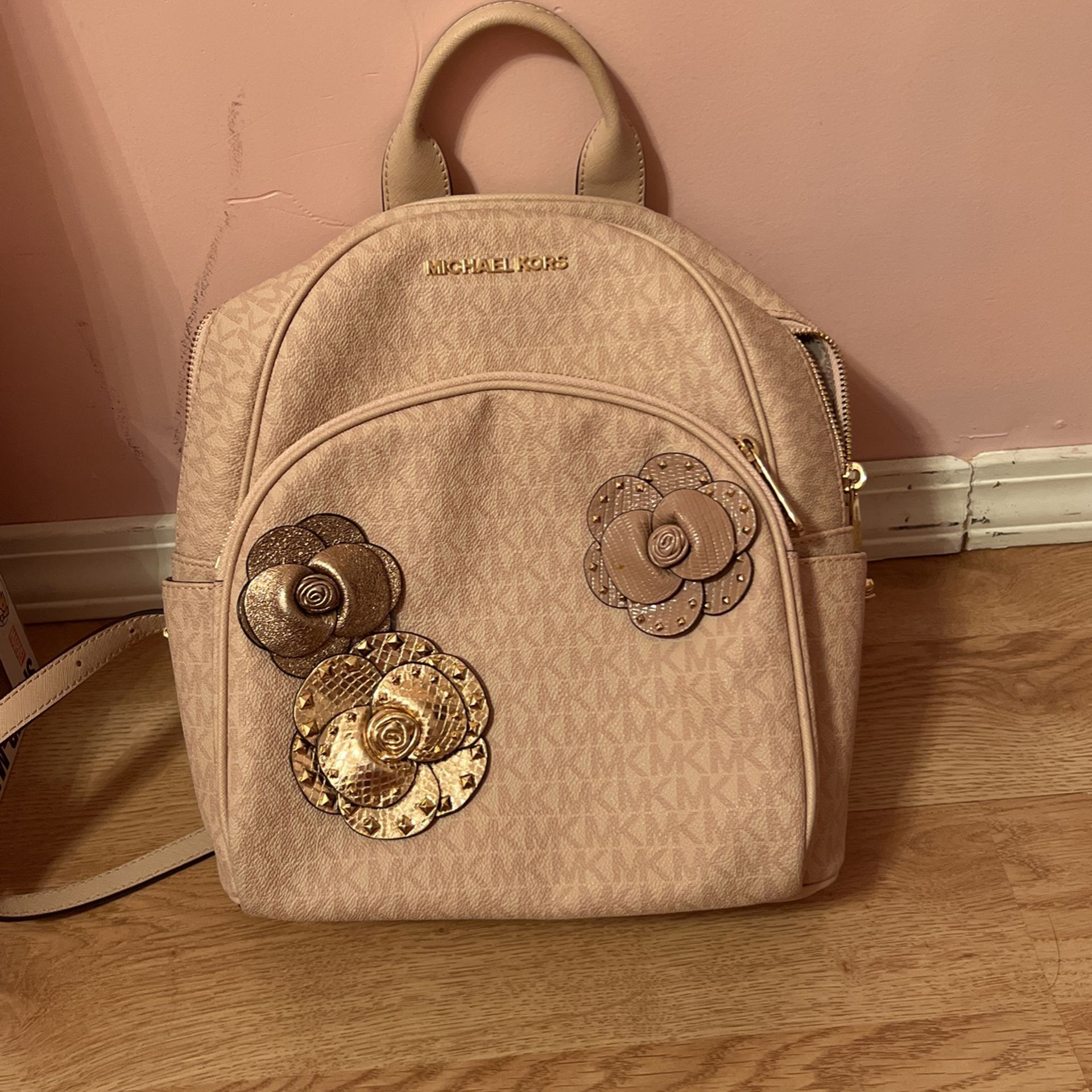 Pink Michael Kors Flower backpack for Sale in West Chicago, IL - OfferUp