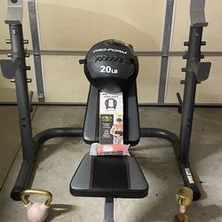 Adjustable Squat Rack Plus Adjustable Bench 20lb Weight Ball One 15lb Kettlebell One 15lb Dumbbell one jump rope one waist trimmer and one running bel
