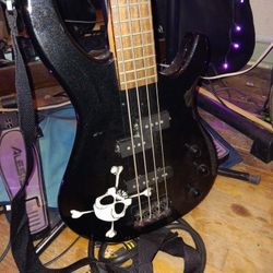 SQUIER BASS GUITAR CROSSBONES RARE