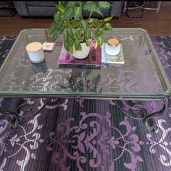 Very nice  Glass and wrought iron coffee table And End Tables 
