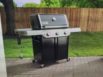 WEBER GENESIS E-315 BLACK 3 - BURNER LIQUID PROPANE GAS GRILL.  NVER USED INBOX..NEEDS ASSEMBLING