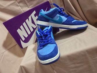 Nike SB Dunk Low sneakers, likely the "Blue Fury" colorway.