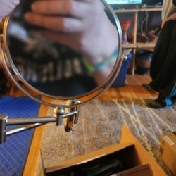 USED OVENTE WALL MOUNTED MIRROR W/ EXTENDABLE ARM 1 SIDE MIRROR OTHER SIDE A MAGNIFIER