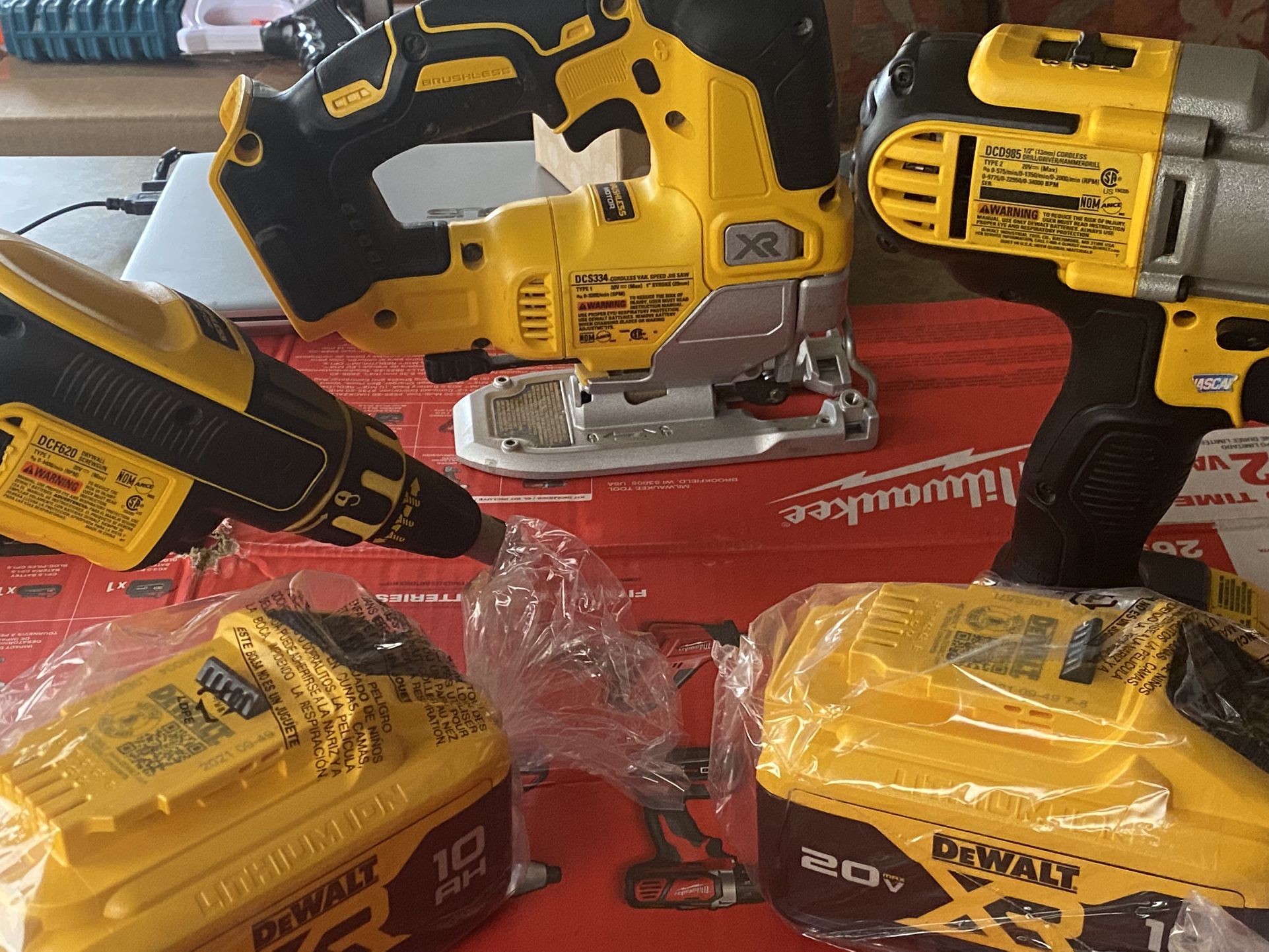 DEWALT 20V SLIGHTLY USED JIGSAW#DCS334 $90,DRYWALL SCREWGUN #DCF620 $100 ,1/2 HAMMER DRILL#DCD985 $80 BATTERY 10Ah $85 Each (rarely Used Read Below)